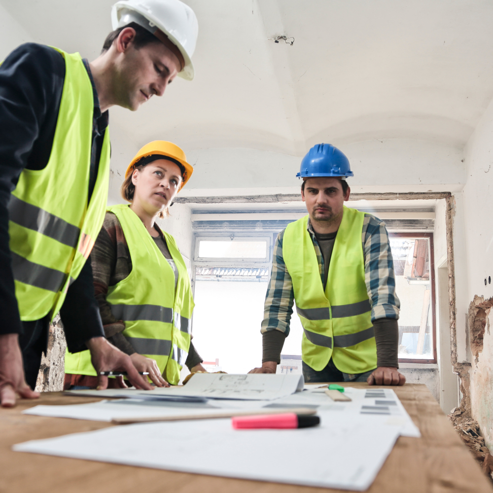 Experienced AtoZ Construction contractors collaborating on a project site, showcasing teamwork and expertise.Picture