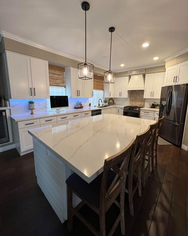 Luxurious and modern kitchen designed by AtoZ Construction, featuring elegant fixtures, stylish tiling, and a spacious layout.Picture