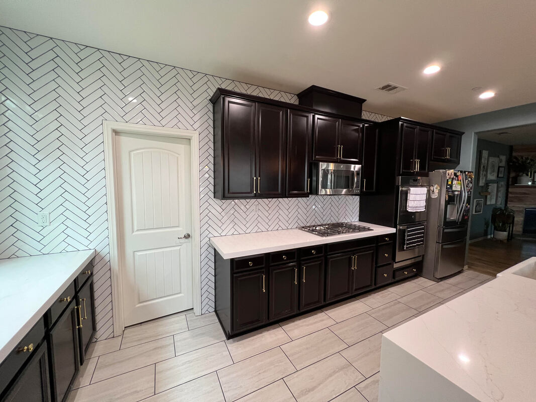 Elegant dining area designed by AtoZ Construction, featuring modern decor and a sophisticated ambiance.Picture