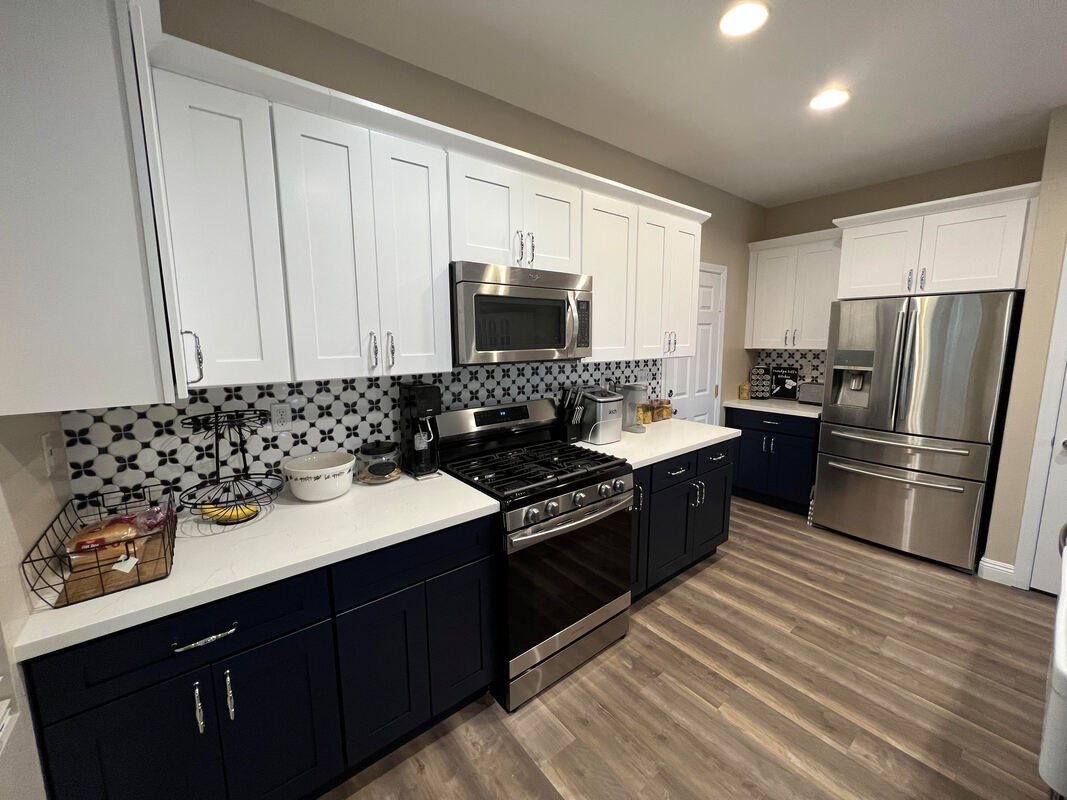 Sophisticated and cozy kitchen designed by AtoZ Construction, featuring elegant furniture, stylish decor, and a welcoming ambiance.Picture