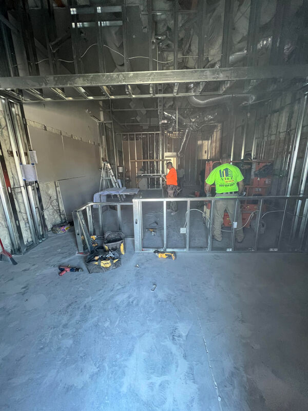 Professional construction team at AtoZ Construction, collaborating on-site to deliver high-quality building projects.Picture